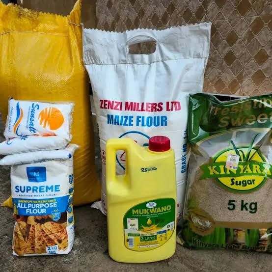 Food pack supplies including maize flour, cooking oil, and sugar for families in need